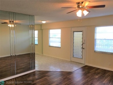 LOOK NO FURTHER! CAN BE RENTED RIGHT AWAY. THIS VERY CLEAN TOP on Flamingo Lakes Country Club in Florida - for sale on GolfHomes.com, golf home, golf lot