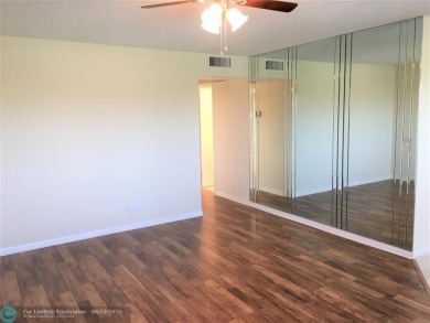 LOOK NO FURTHER! CAN BE RENTED RIGHT AWAY. THIS VERY CLEAN TOP on Flamingo Lakes Country Club in Florida - for sale on GolfHomes.com, golf home, golf lot