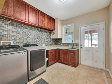 This sizable home has 5-bedrooms and 3 updated bathrooms. There on Woodland Hills Golf Club in Texas - for sale on GolfHomes.com, golf home, golf lot
