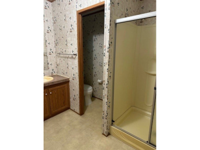 Location! Location! This Waterview 3B/2B MH is walk in ready & on Cypress Bend Golf Course in Texas - for sale on GolfHomes.com, golf home, golf lot
