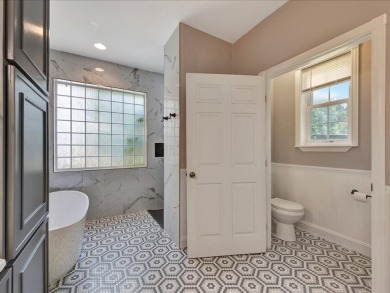 This sizable home has 5-bedrooms and 3 updated bathrooms. There on Woodland Hills Golf Club in Texas - for sale on GolfHomes.com, golf home, golf lot