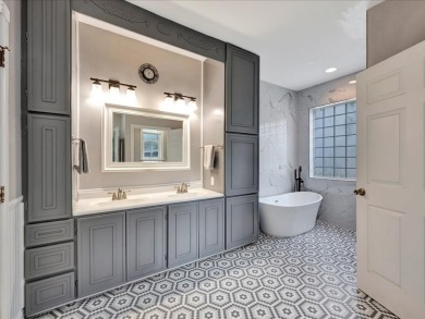 This sizable home has 5-bedrooms and 3 updated bathrooms. There on Woodland Hills Golf Club in Texas - for sale on GolfHomes.com, golf home, golf lot