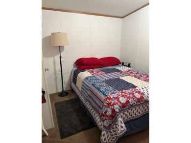 Location! Location! This Waterview 3B/2B MH is walk in ready & on Cypress Bend Golf Course in Texas - for sale on GolfHomes.com, golf home, golf lot