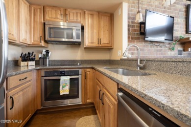Lovely South facing three bedroom townhouse with tons of natural on Eagle Vail Golf Course in Colorado - for sale on GolfHomes.com, golf home, golf lot