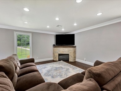 This sizable home has 5-bedrooms and 3 updated bathrooms. There on Woodland Hills Golf Club in Texas - for sale on GolfHomes.com, golf home, golf lot