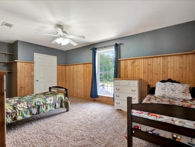This sizable home has 5-bedrooms and 3 updated bathrooms. There on Woodland Hills Golf Club in Texas - for sale on GolfHomes.com, golf home, golf lot