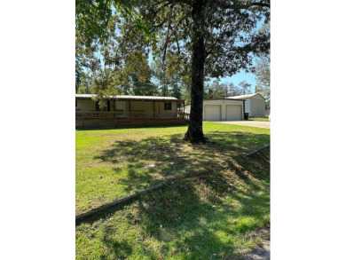 Location! Location! This Waterview 3B/2B MH is walk in ready & on Cypress Bend Golf Course in Texas - for sale on GolfHomes.com, golf home, golf lot