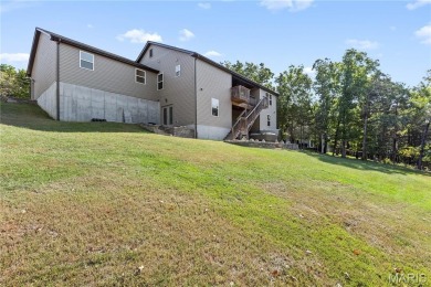 Remarkable property on Ridgecrest Dr. that might be exactly what on Raintree Country Club in Missouri - for sale on GolfHomes.com, golf home, golf lot