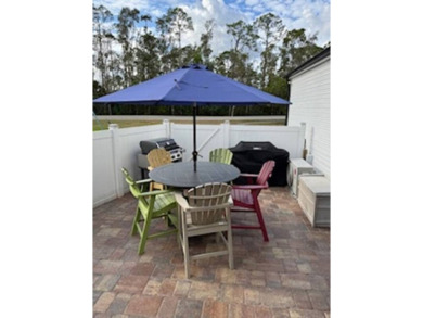 The lot rent for this home is $1,815.00/monthly.  Serene Golf on Pine Lakes Country Club in Florida - for sale on GolfHomes.com, golf home, golf lot