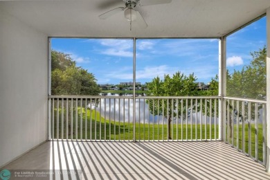 Enjoy serene water views of the lake and fountain as soon as you on Palm-Aire Country Club and Resort - Palms in Florida - for sale on GolfHomes.com, golf home, golf lot