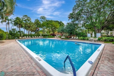 Enjoy serene water views of the lake and fountain as soon as you on Palm-Aire Country Club and Resort - Palms in Florida - for sale on GolfHomes.com, golf home, golf lot