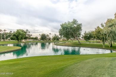 Located on a premium corner lot in amenity-rich Sun Village on Sun Village Golf Course in Arizona - for sale on GolfHomes.com, golf home, golf lot