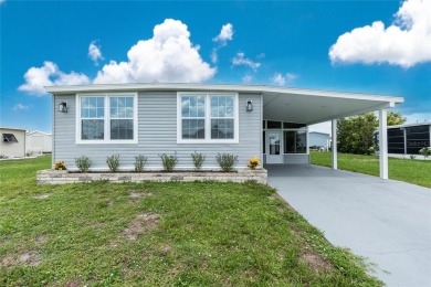 One or more photo(s) has been virtually staged. Move in Ready! on Oyster Creek Golf Club in Florida - for sale on GolfHomes.com, golf home, golf lot
