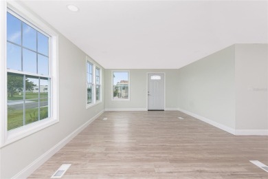 One or more photo(s) has been virtually staged. Move in Ready! on Oyster Creek Golf Club in Florida - for sale on GolfHomes.com, golf home, golf lot