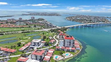 Experience Waterfront Living in this Charming 2-Bed, 2-Bath on Isla Del Sol Yacht and Country Club in Florida - for sale on GolfHomes.com, golf home, golf lot
