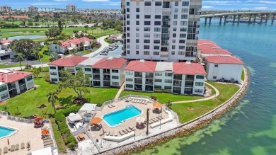 Experience Waterfront Living in this Charming 2-Bed, 2-Bath on Isla Del Sol Yacht and Country Club in Florida - for sale on GolfHomes.com, golf home, golf lot