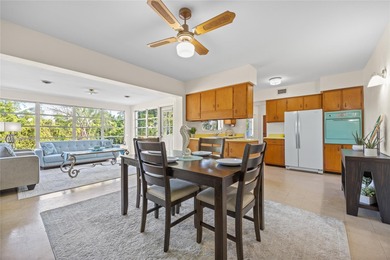 Step back in time and fall in love with this vintage Dunedin on The Dunedin Country Club in Florida - for sale on GolfHomes.com, golf home, golf lot