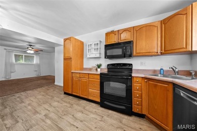 Updated ground floor condo has two spacious bedrooms and an on Lake Saint Louis Par 3 in Missouri - for sale on GolfHomes.com, golf home, golf lot