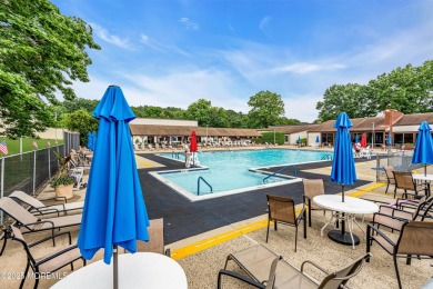 Beautifully Renovated upper level 1-bedroom 1 bath with enclosed on Pine Brook Golf Course in New Jersey - for sale on GolfHomes.com, golf home, golf lot
