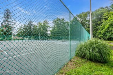 Beautifully Renovated upper level 1-bedroom 1 bath with enclosed on Pine Brook Golf Course in New Jersey - for sale on GolfHomes.com, golf home, golf lot