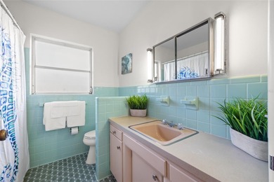 Step back in time and fall in love with this vintage Dunedin on The Dunedin Country Club in Florida - for sale on GolfHomes.com, golf home, golf lot