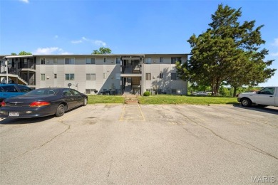 Updated ground floor condo has two spacious bedrooms and an on Lake Saint Louis Par 3 in Missouri - for sale on GolfHomes.com, golf home, golf lot