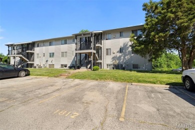 Updated ground floor condo has two spacious bedrooms and an on Lake Saint Louis Par 3 in Missouri - for sale on GolfHomes.com, golf home, golf lot