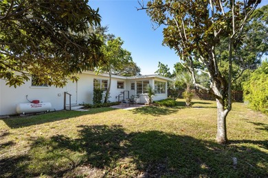 Step back in time and fall in love with this vintage Dunedin on The Dunedin Country Club in Florida - for sale on GolfHomes.com, golf home, golf lot