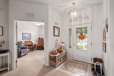 Experience golf course living at its most inviting- Situated on Ocala Palms Golf and Country Club in Florida - for sale on GolfHomes.com, golf home, golf lot