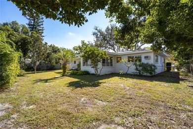 Step back in time and fall in love with this vintage Dunedin on The Dunedin Country Club in Florida - for sale on GolfHomes.com, golf home, golf lot
