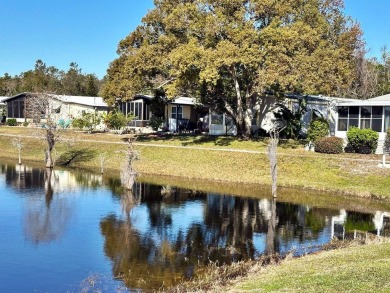 WOW!! The Golf Course and the Water! This is awesome Home in the on Lakes at Leesburg Golf Course in Florida - for sale on GolfHomes.com, golf home, golf lot