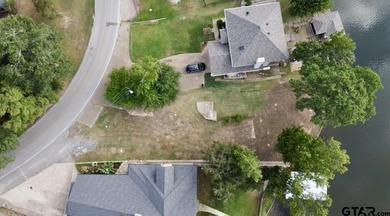 Lakeside Serenity Awaits at 616 Hideaway Lane East!  Tucked on Hide-A-Way Lake Golf Course in Texas - for sale on GolfHomes.com, golf home, golf lot