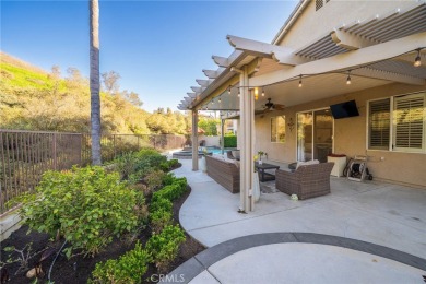 Nestled at the end of a quiet cul-de-sac, this stunning, fully on Los Serranos Country Club in California - for sale on GolfHomes.com, golf home, golf lot