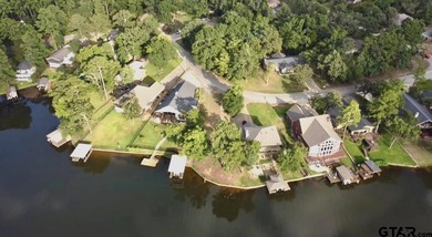 Lakeside Serenity Awaits at 616 Hideaway Lane East!  Tucked on Hide-A-Way Lake Golf Course in Texas - for sale on GolfHomes.com, golf home, golf lot