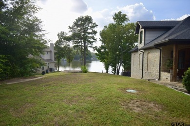 Lakeside Serenity Awaits at 616 Hideaway Lane East!  Tucked on Hide-A-Way Lake Golf Course in Texas - for sale on GolfHomes.com, golf home, golf lot