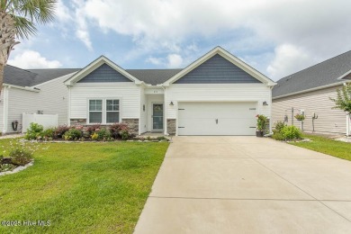 Upgrades galore in this beautiful 4BR/2BA home in the quaint on Ocean Ridge Plantation in North Carolina - for sale on GolfHomes.com, golf home, golf lot