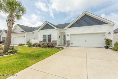 Upgrades galore in this beautiful 4BR/2BA home in the quaint on Ocean Ridge Plantation in North Carolina - for sale on GolfHomes.com, golf home, golf lot