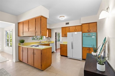 Step back in time and fall in love with this vintage Dunedin on The Dunedin Country Club in Florida - for sale on GolfHomes.com, golf home, golf lot