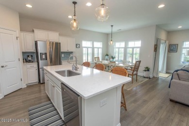 Upgrades galore in this beautiful 4BR/2BA home in the quaint on Ocean Ridge Plantation in North Carolina - for sale on GolfHomes.com, golf home, golf lot