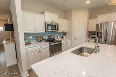 Upgrades galore in this beautiful 4BR/2BA home in the quaint on Ocean Ridge Plantation in North Carolina - for sale on GolfHomes.com, golf home, golf lot