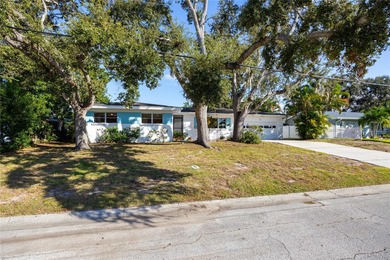 Step back in time and fall in love with this vintage Dunedin on The Dunedin Country Club in Florida - for sale on GolfHomes.com, golf home, golf lot