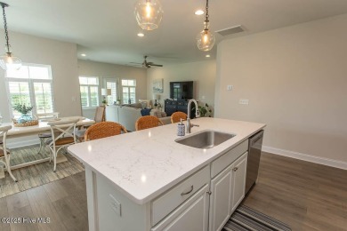 Upgrades galore in this beautiful 4BR/2BA home in the quaint on Ocean Ridge Plantation in North Carolina - for sale on GolfHomes.com, golf home, golf lot
