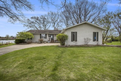Charming ranch walkout with 120' of sandy beach on all sports for sale on GolfHomes.com
