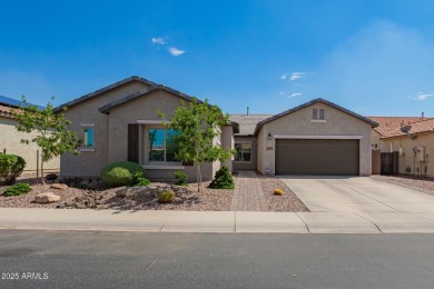 Welcome to your dream home, nestled in a vibrant neighborhood on Poston Butte Golf Club in Arizona - for sale on GolfHomes.com, golf home, golf lot