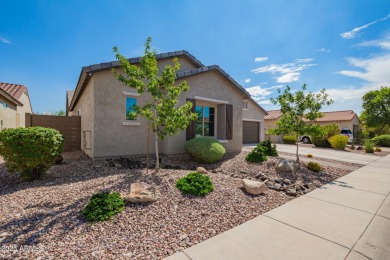 Welcome to your dream home, nestled in a vibrant neighborhood on Poston Butte Golf Club in Arizona - for sale on GolfHomes.com, golf home, golf lot