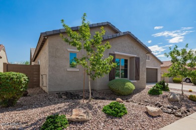 Welcome to your dream home, nestled in a vibrant neighborhood on Poston Butte Golf Club in Arizona - for sale on GolfHomes.com, golf home, golf lot