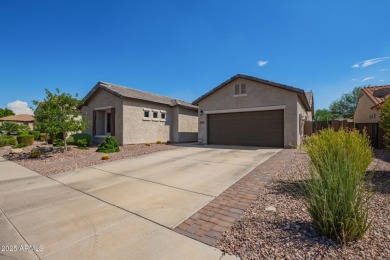 Welcome to your dream home, nestled in a vibrant neighborhood on Poston Butte Golf Club in Arizona - for sale on GolfHomes.com, golf home, golf lot