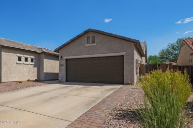 Welcome to your dream home, nestled in a vibrant neighborhood on Poston Butte Golf Club in Arizona - for sale on GolfHomes.com, golf home, golf lot