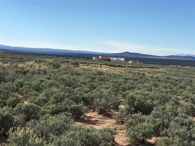 This is a stunning lot with views and privacy on the 8th Fairway on Taos Country Club in New Mexico - for sale on GolfHomes.com, golf home, golf lot