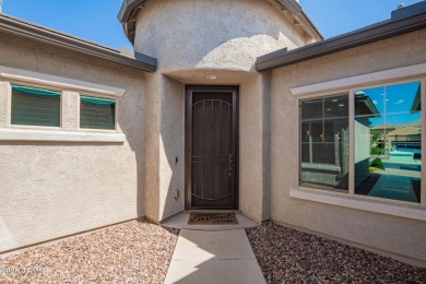 Welcome to your dream home, nestled in a vibrant neighborhood on Poston Butte Golf Club in Arizona - for sale on GolfHomes.com, golf home, golf lot